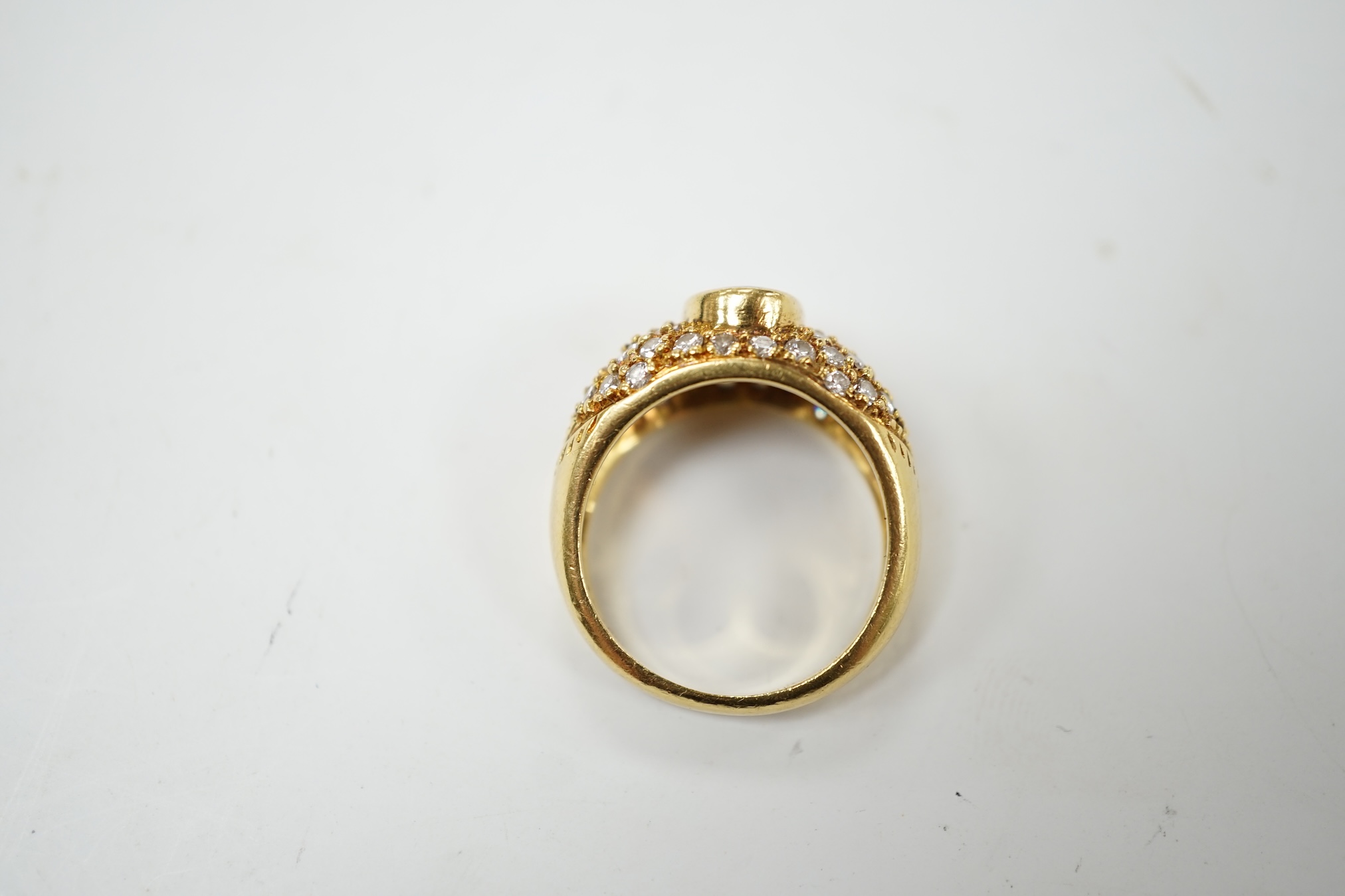 A modern 750 yellow metal and back opal set dress ring with diamond cluster set shoulders, size L, gross weight 6.9 grams. Condition - fair